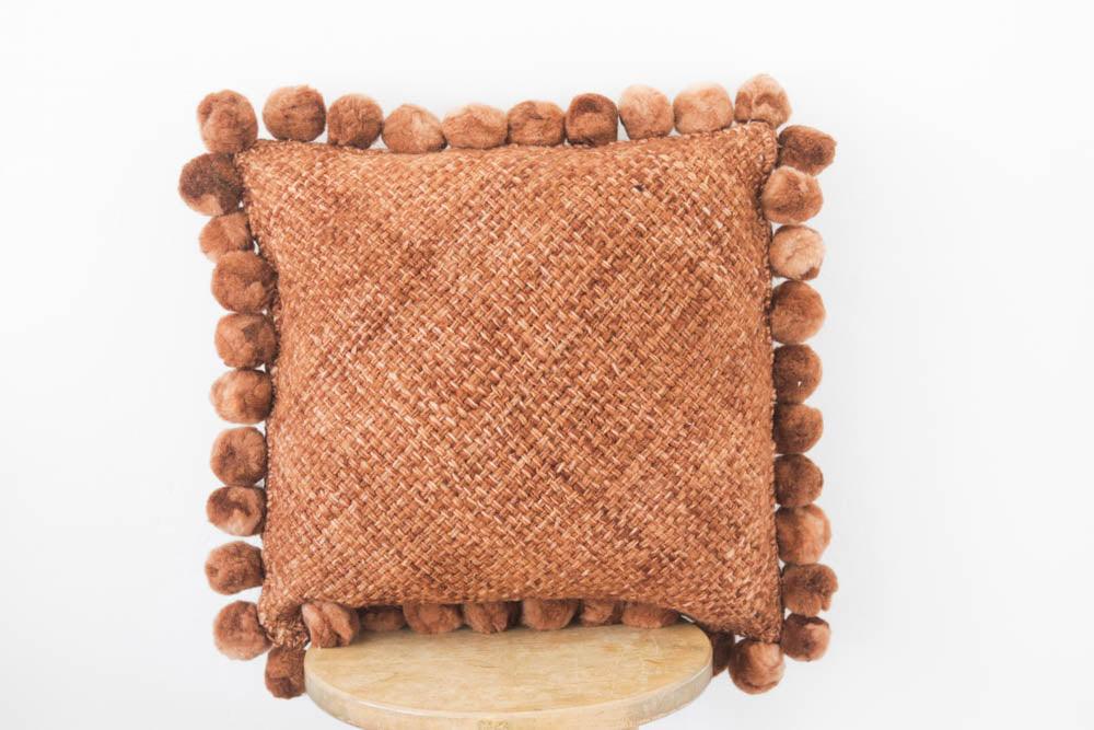 Salta Pom Pom 20" Pillow in Rust - Ebb and Thread