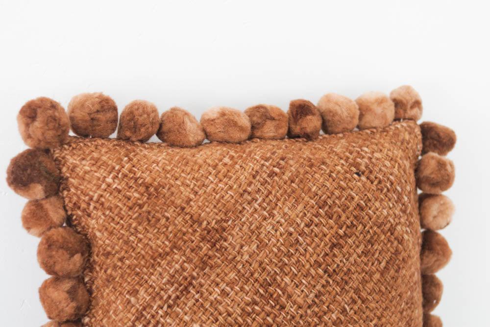 Salta Pom Pom 20" Pillow in Rust - Ebb and Thread