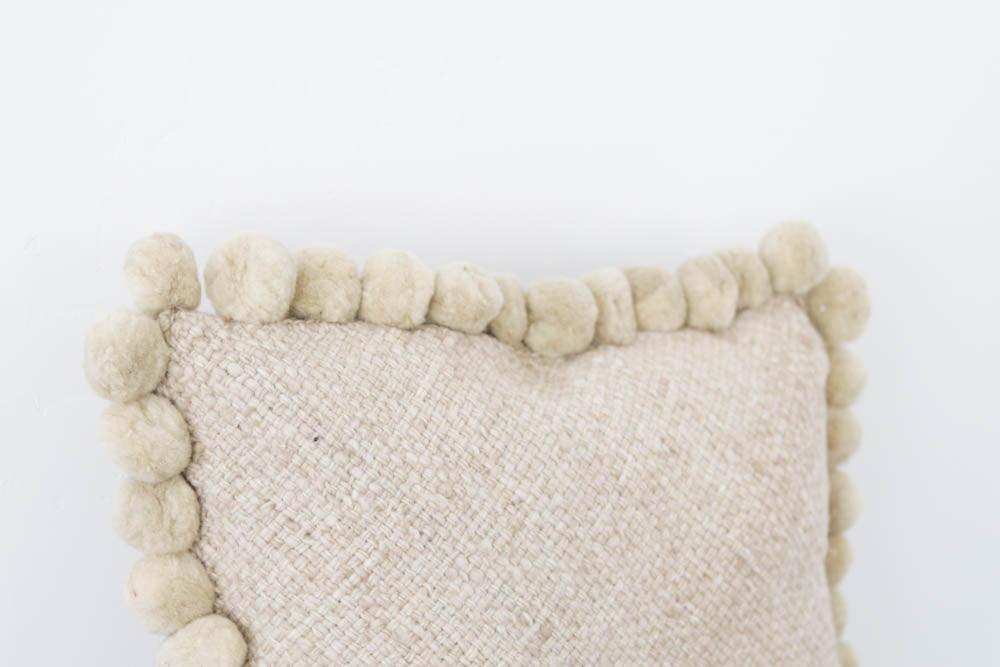 Salta Pom Pom 24" Pillow in Sand - Ebb and Thread